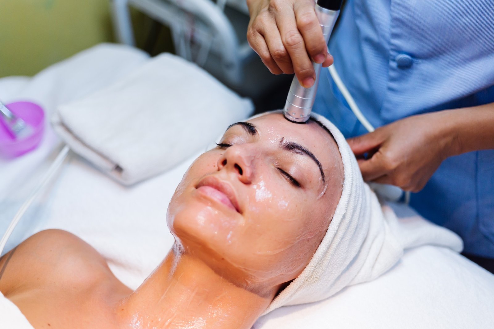 Acne solutions facial treatment with a professional device