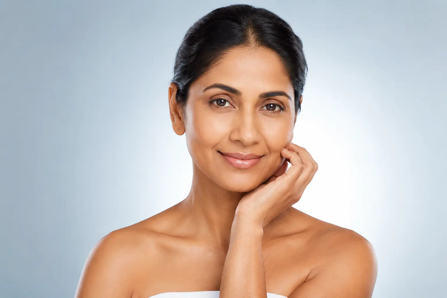 Anti-aging skin treatment – mature woman with smooth, youthful skin after cosmetic procedure