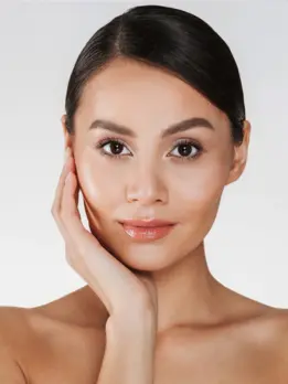 A close-up  face that shows no obvious flaws or scars and smooth skin with our advanced treatment